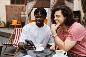 Joyful moments shared between a loving gay couple enjoying coffee together at a cafe