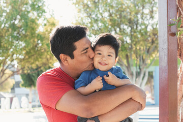 Fototapeta premium Joyful father and baby bonding in nature