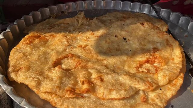 Large paratha being prepared in Zakaria street for Ramdan 2025