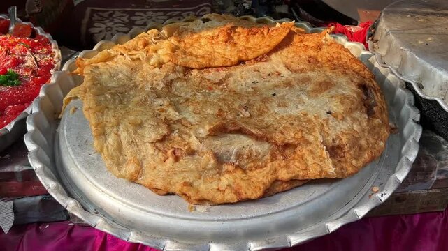 Close up shot of large size paratha prepared during Ramadan in Zakaria street Kolkata