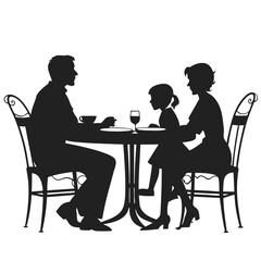 Family having their dinner at the table silhouette