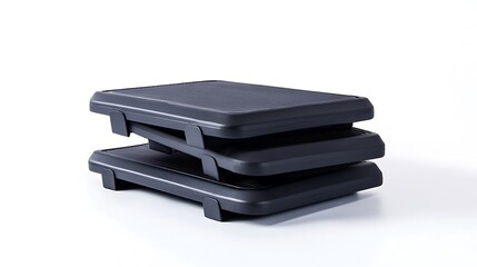 Three black laptop stands stacked on top of each other