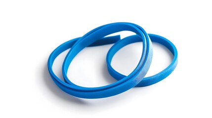 Fototapeta premium Two blue rubber bands are laying on a white background