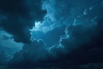 Dark, brooding storm clouds fill the ominous night sky , storm clouds, intense, nature