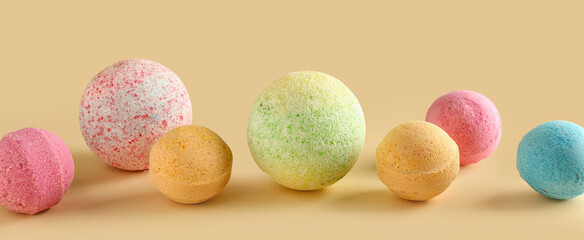 Bath bombs on beige background