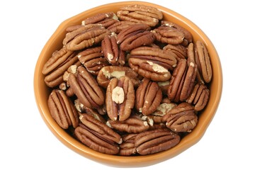Obraz premium Delicious Pecan Nuts in Brown Bowl Close Up