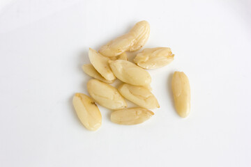 Pile of peeled walnut isolated on white background