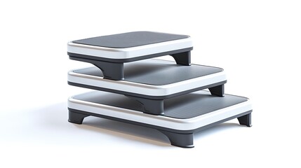 Three stacked black and white step stools