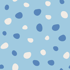 Seamless vector pattern with blue and white polka dots.