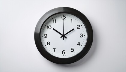 A round wall clock placed on a white background