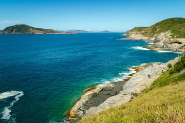 Top view of the back of Praia das Conchas. With many rocks, mountains and islands in the background. Near the city of Cabo Frio, Rio de Janeiro.