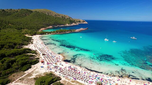 Mallorca (Majorca) island best scenic beaches - Agulla with crystal turquoise sea. aerial drone 4k hd video. Spain, Balearic islands
