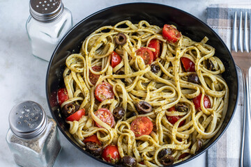 linquine with pesto, tomatoes and olives