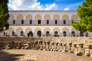 An exhibition of statues and pottery from nearby excavations, in background Carthage National Museum located on Byrsa Hill , Carthage, Tunisia.