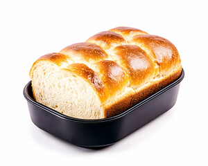 Golden-brown, crusty bread loaf, partially sliced, in a dark baking pan, isolated on white