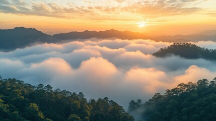 Sunrise over misty mountains