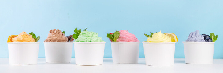 Frozen yogurt assortment. Soft creamy ice cream with chocolate, vanilla, berry, fruit flavors....