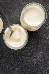 Skyr white yogurt appetizer dish fresh delicious gourmet food background on table rustic food top view copy space keto and paleo diet vegetarian food