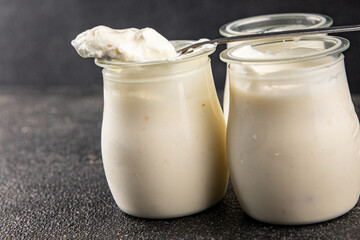 Skyr white yogurt appetizer dish fresh delicious gourmet food background on table rustic food top view copy space keto and paleo diet vegetarian food