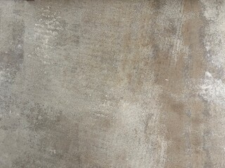 concrete wall or floor in light brown and grey with golden flake and structure as backdrop and wallpaper