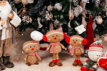 Christmas Tree with Gifts and Toys Decor for New Year at home. Beautiful holiday decorations. The vibrant display creates cheerful and traditional holiday atmosphere