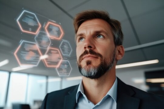 Focused man contemplating digital data in modern office setting,