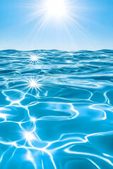 Serene ocean scene with sunlit waves and clear blue water