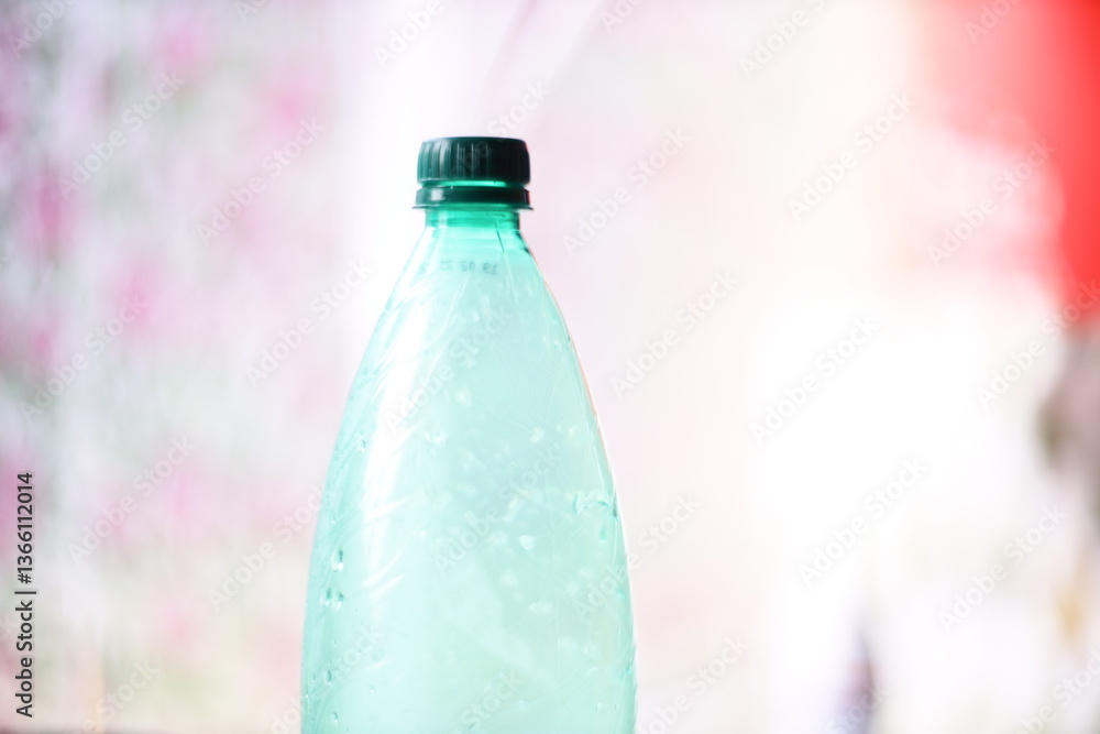 Aufkleber A single bottle of soda placed on a flat surface, ready for use or display.