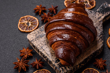 Sweet fresh crispy croissant with chocolate filling