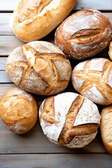 variety of freshly baked bread and pastries on rustic wooden table with ample copy space for text or logos showcasing
