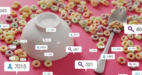 Scattered colorful cereal with social media icons over pink background in animation - Powered by Adobe