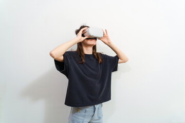 girl in viar glasses, virtual reality glasses on a white background