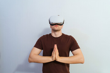 Man wearing virtual reality headset.A young guy in glasses and technology is a lifestyle future guy.