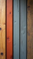 Fototapeta premium A stunning arrangement of wooden planks showcases a harmonious blend of warm orange, cool gray, and rich brown tones. This visually striking composition highlights the natural beauty of wood, inviting