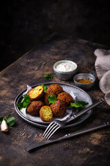 Middle Eastern falafel balls with sauce
