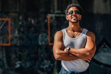 portrait of a young man on the street in urban style