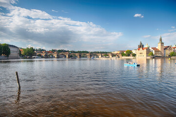 Charles Bridge crossing Vltava River in Prague, Czech Republic