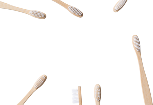 Set of ECO friendly wooden bamboo toothbrushes. Save the planet or NO plastic concept. Isolated on white background.