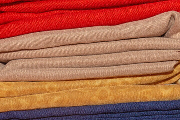 Neatly Folded Fabric Stack in Various Colors