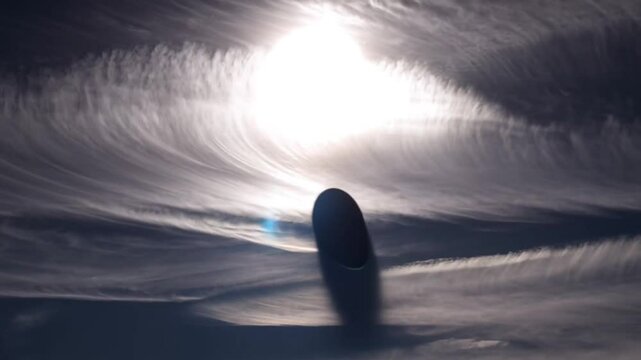 a strange object with bright light in the sky