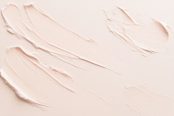Different stain samples of multicolored cosmetic foundations. Mixed beige colors for different skin tones, textures, lotions and face and body care products