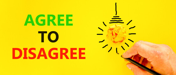 Agree to disagree symbol. Concept words Agree to disagree on beautiful yellow paper. Beautiful...