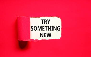 Try something new symbol. Concept words Try something new on beautiful white paper. Beautiful red paper background. Business motivational lifestyle try something new concept. Copy space.