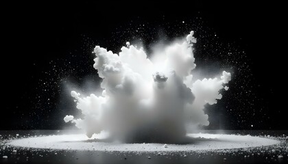 A dynamic studio shot captures a burst of white powder against a stark black background, creating a high-contrast image