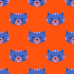 Vector contemporary repeating design with smiling feline faces. Bright, playful cats seamless pattern perfectly for nursery fabrics, wallpapers and cute pet themed surfaces.