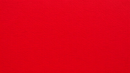 Fototapeta premium A vivid red surface with a subtle texture captivates attention, suitable for various creative applications such as backgrounds or art projects, enhancing visual interest in any setting