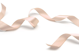 Light beige glow nacre color wave silk ribbon with light shadow on white background.