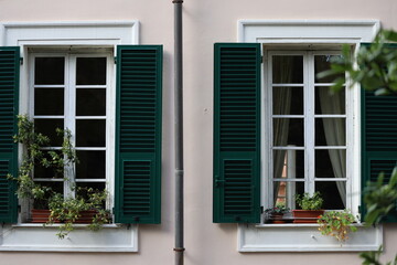 Windows with shutters in Italian style