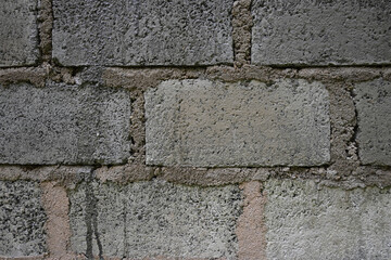 Surface view of an outdoor cement wall made using cement blocks