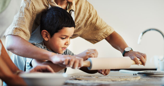 Roller, kitchen and child with parents, baking and helping son with ingredients, bonding and together. Hands, growth and development of fine motor skills for kid, people and cake for boy in home
